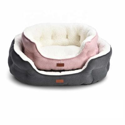 China Durable Comfortable Home Soft Pet Cuddler Warm Padded Dog Bed With Ultrasonic Wave Knurling for sale