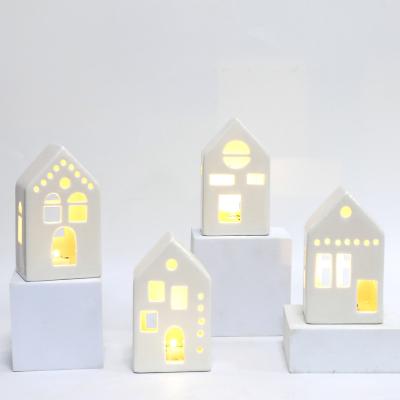 China Wholesale Ceramic Factory Wholesale Classic Pure White Ceramic Glitter Christmas Village House With LED Lights for sale