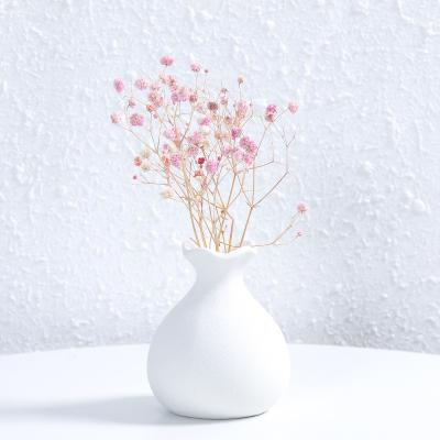 China Modern Nordic White Vase Irregular Shape Decoration Home Style Custom Tabletop Ceramic Flower Vases Porcelain Flower Vases For Wedding Ornaments for sale