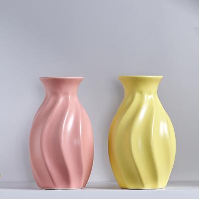 China New Modern Creative Ceramic Floral Centerpiece Matte Petal Vase Vases For Flower Home Decor for sale