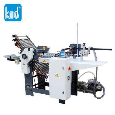 China Factory KMD 470T C0185 470T 6buckles+1knife automatic medicine leaflet folding machine for sale