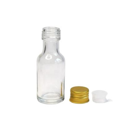 China 30ml Small Glass Beverage Bottles For Liquid Clear Wine Bottles for sale