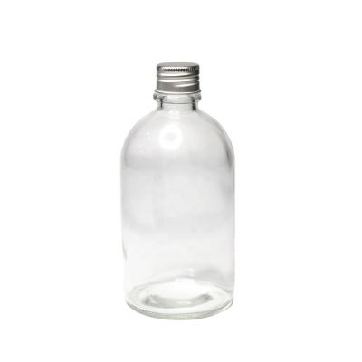 China Beverage Beverage Use 250ml Empty Round Juice Bottle With Tamper Evident Glass Cap For Tea for sale