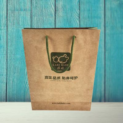 China Custom Natural Logo Ribbon Handle Style Shopping Brown Bags Recyclable Paper Bags For Clothes for sale