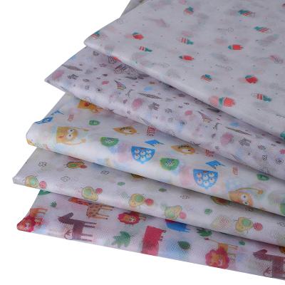 China 100% skin-friendly sustainable pp waterproof fabric nonwoven dustproof kids colored printed pp print nonwoven fabric for sale