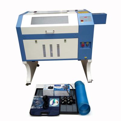 China Laser Engraving 80W CO2 Laser Engraving And Cutting Machine With Honeycomb Table Support Coreldraw CNC for sale