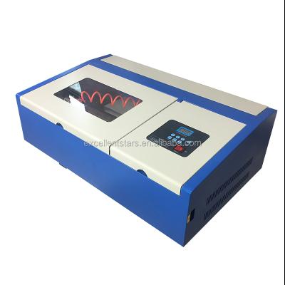 China Laser Engraving CO2 Laser Engraving and Cutting Machine, Mini Fiber Laser Marking Machine for sale