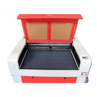 China Laser REDUCING cheap price! DSP Laser Engraving Cutting Machine CO2 Laser Cutting Machine Price 1390 for sale