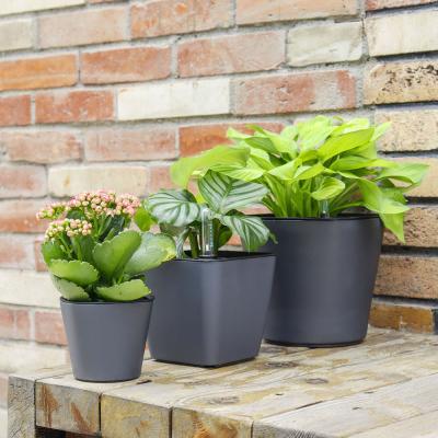 China Simply Self-watering Outdoor White Plastic Flower Pot Simple Design Cactus Grass Household Plastic Products for sale