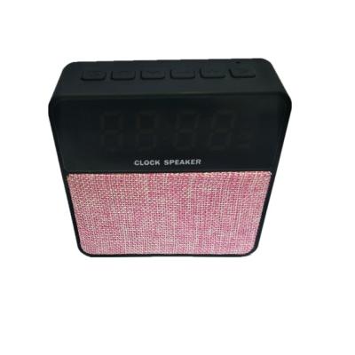 China New wireless portable alarm clock T1 fabric blue tooth speaker with fm radio SHENZHEN factory for sale