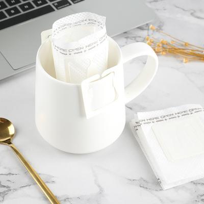 China Drip Coffee Filter Bag Wholesales Hanging Ear Paper Cup Disposable Drip Coffee Filter Bag For Coffee Powder for sale