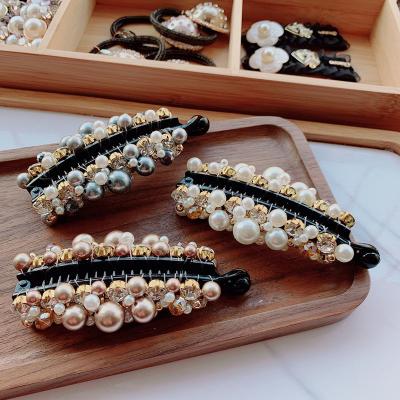 China Handcrafted hair claw makers direct round pearl banana hair clip ponytail vertical clip fashion soft hair accessories for sale