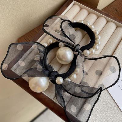 China Black Faux Pearl Rope Hair Scrunchies Hair Tie Elastic Band Girls Headwear Korean Elastic Bands Wholesale Headband Rubber Bands with Pearls for sale