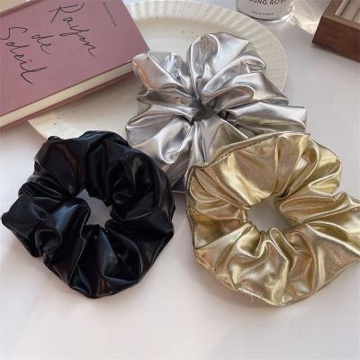 China Simple Elastic Hair Scrunchies PU Material Beautiful Hair Elastic Rope Ties For Ladies Hair Accessories for sale