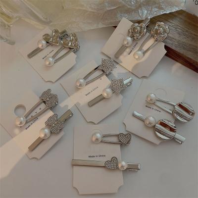 China Hair clip Europe and the United States hair clip new high-grade pearl metal irregular cold wind hair accessories hairpin for sale