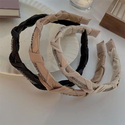 China Popular Retro All-match Fashion Twist Headband Wash Edge Hair Accessories Wide Non-Slip Cloth Non-Slip Band For Young Girls for sale