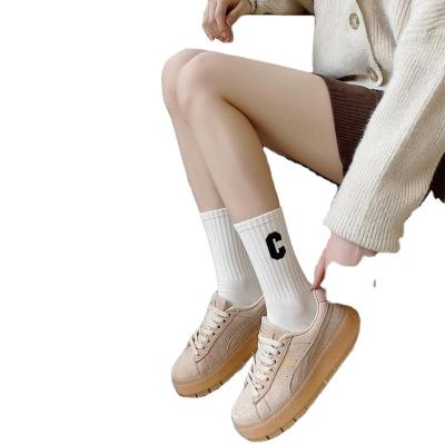 China Custom Quality Cotton Sporty Mens Designer Letter Logo Compression Women Compression Embroidery Grip Fashion Crew Socks for sale