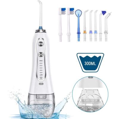 China 2021 Oral Flosser Portable Electric Household Water Flosser Rechargeable Cordless Water Irrigator Dental Flosser For Teeth Cleaning. for sale