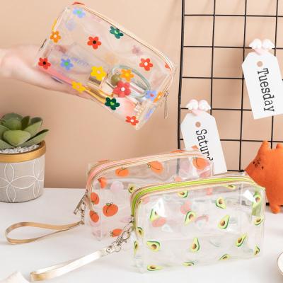 China Fashion Ready to Ship Clear PVC Printing Waterproof Makeup Organizer Toiletry Bag Zipper Pouch Beautiful PVC Cosmetic Bag for sale