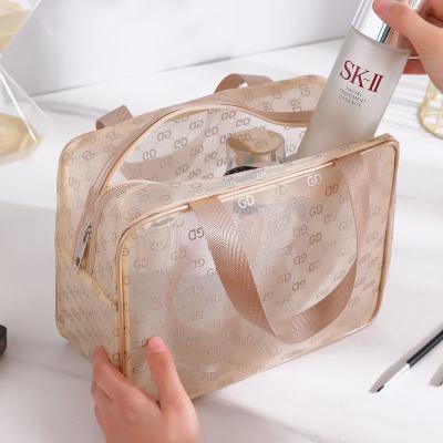 China Fashion Clear Nylon Mesh Makeup Bag Gold Transparent Large Capacity Cosmetic Bag Available For Custom Logo Mesh Cosmetic Bag for sale