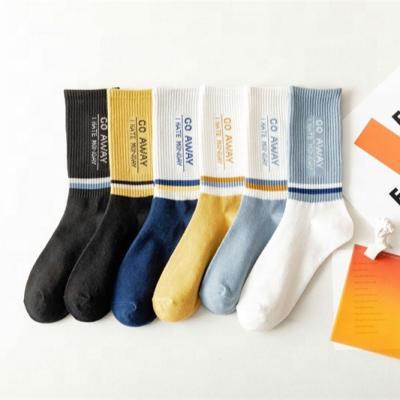 China Fashionable style hot pure color street cotton sale cotton block printed unisex cotton crew length socks for sale