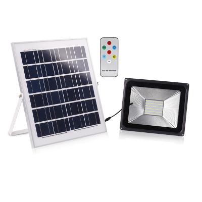 China 100W portable solar ip66 led flood light residential energy saving aluminum earth sport garden sports for sale