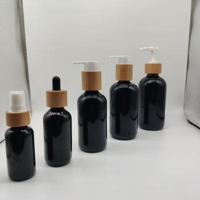 China 20-200ml Black Luxury High End Cosmetic Jade Glass Bottle For Serum Essential Oil With Bamboo Lid Dropper Pump for sale