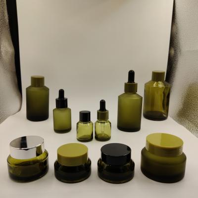 China Good Selling Luxury Skin Care Set Oil Serum Olive Packing Bottle Skin Glass Bottle Set for sale