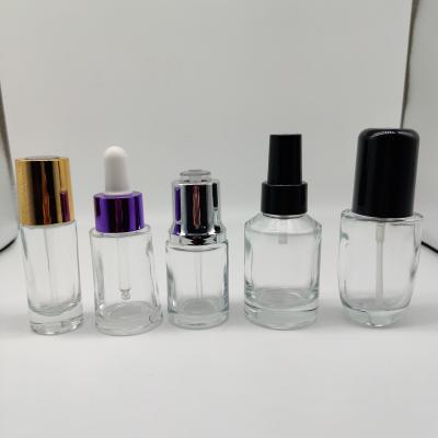 China Factory Hot Selling Cosmetic Stock 30ml Cosmetic Packaging Frosted Clear Essential Oil Glass Bottle With Black/White Dropper for sale