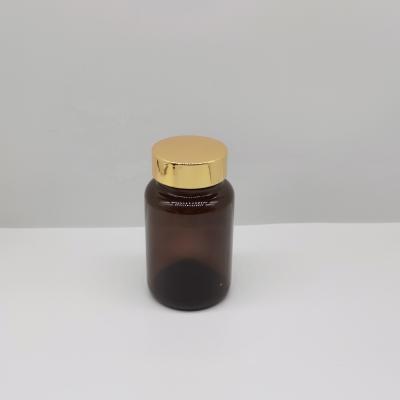 China 100ml Cosmetic Storage Bottles Series 100ml Cosmetic Glass Capsule Amber Glass Bottles With Gold Lid Products for sale