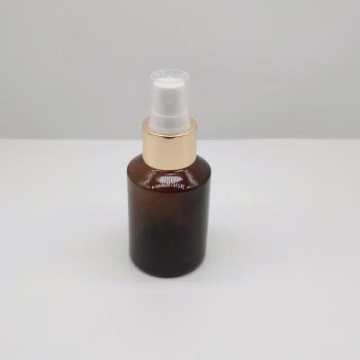 China 60ml Cosmetic Bottle Packaging Series Cosmetic Glass Amber Glass Bottle With Gold Spray Pump Products for sale