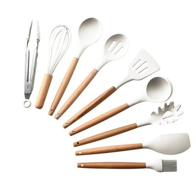 China Viable White Wooden Kitchenware Accessories Cookware Stick Food Grade Handle Spatula Silicone Spoon Set Non for sale