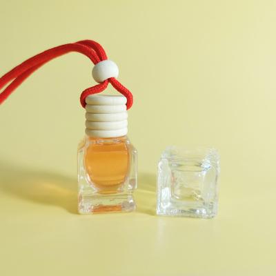 China Factory Price Wholesale Air Freshener 9ml Glass Bottle Car Cosmetic Empty Hanging Perfume Bottle With Wooden Lid for sale