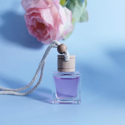 China Hanging Car 11ml Cosmetic Essential Oil Perfume Aromatherapy Diffuser Bottle Hanging Empty Diffuser Bottle for sale