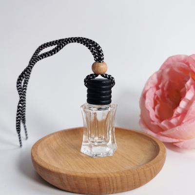 China Wholesale 7ml Cosmetic Clear Car Diffuser Glass Bottle Car Hanging Empty Perfume Bottle With Wooden Cap for sale