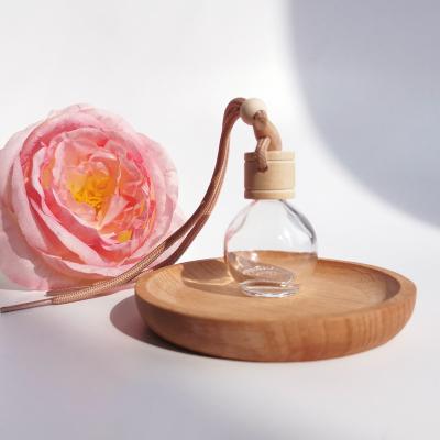 China Cosmetic Car Pendant Hanging Aroma Scents Car Perfume Diffuser Bottle Car Perfume Bottles Container for sale