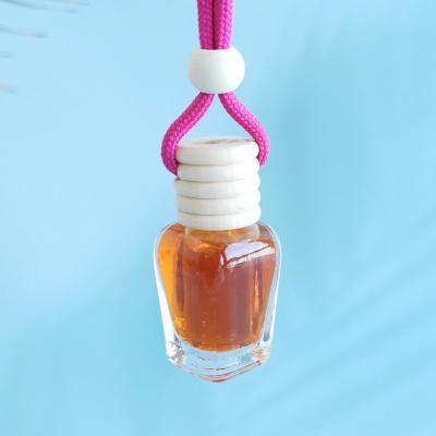 China Unique Rectangular Perfume 8ml Shape Diffuser Bottles Glass Car Perfume Bottle With Wooden Cap And Inner Cap for sale