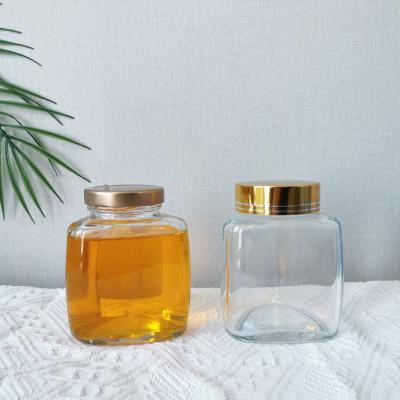 China Food Triangle Shape Small Round Glass Jam Jars Glass With Lid Storage Marine Jar For Food for sale