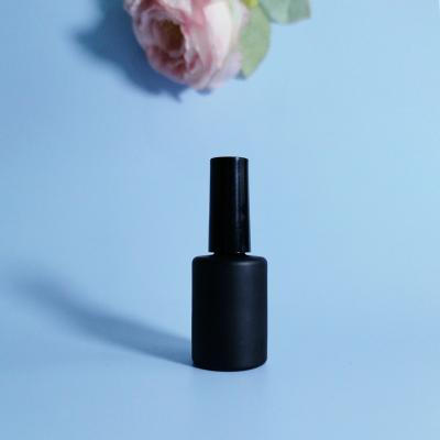 China OEM Round Shape 11ml Matt Black Empty Cosmetic Glass Nail Polish Bottle for sale