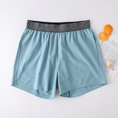 China Anti-Wrinkle Polyester Spandex Mens Sports Shorts With Side Pockets Workout Fitness Men Sports Gym Shorts for sale