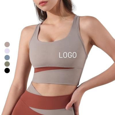 China Hot Selling Breathable Women's Color Matching Sports Running Sports Bra Seamless Fitness Yoga Vest Quick Dry Sportswear for sale