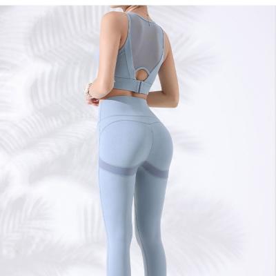 China Breathable seamless yoga gym fitness set sports bra butt gaiters crack! crack! short sleeve top women workout sets for sale