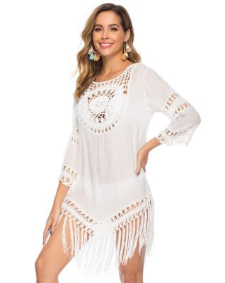 China Anti-Static Boho Dress Women's Summer Tassels Beach Vacation Dress Solid Sunscreen Cut Skirt Beach Cover Up Swimsuit Beach Dress 2021 for sale