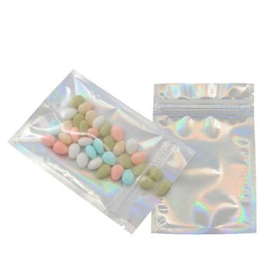 China Recyclable Ready To Ship Holographic Mylar Bag Transparent Colored Zipper Pouch Laser Snack Bag for sale