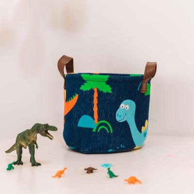 China Viable High Quality Kids Play Folding Storage Bin Quest Dinosaur Canvas Fabric Organizer Basket for sale