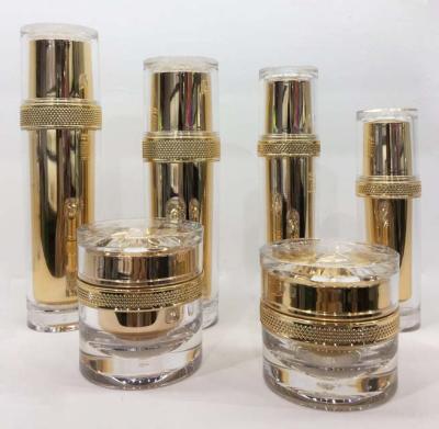 China Personal Care Qunfang Acrylic Luxury Lotion Jar And Bottle Gold Liner Set for sale