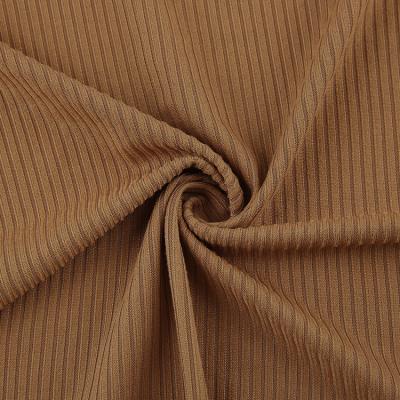 China Double brushed stretch polyester fabric uniqlo home textile jacquard designer 100% polyester ribbed knitted fabric for clothes for sale