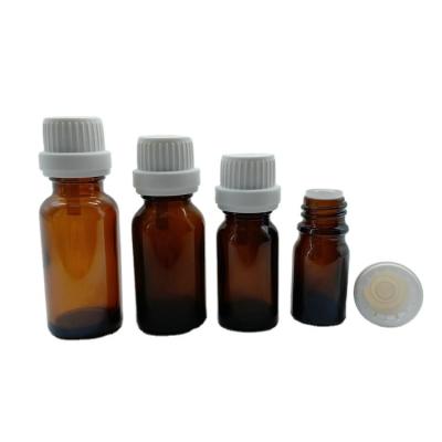 China Pilfer Proof PP Plastic Airtight Pile Proof Cap DIN 18 For Essential Oil Glass Bottle for sale