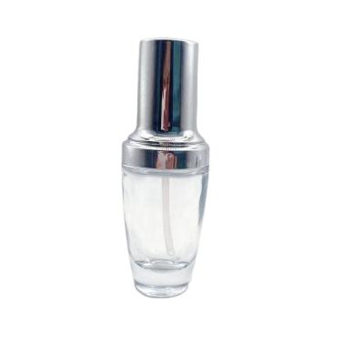 China High Quality Personal Care Bottle 30ml Glass Small Essence Liquid Perfume Black Bottle With Pump Cap for sale