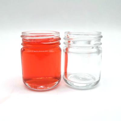 China Beverage Wholesales 20g Round Shape Clear Glass Honey Jar for sale